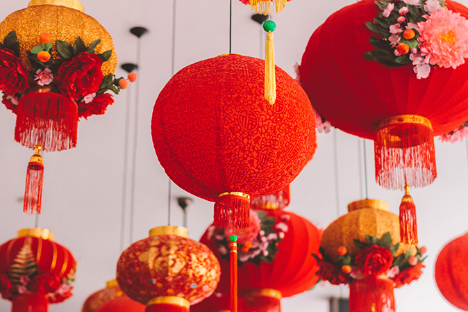 Hanging red lanterns is a traditional business custom in Chinese New Year.